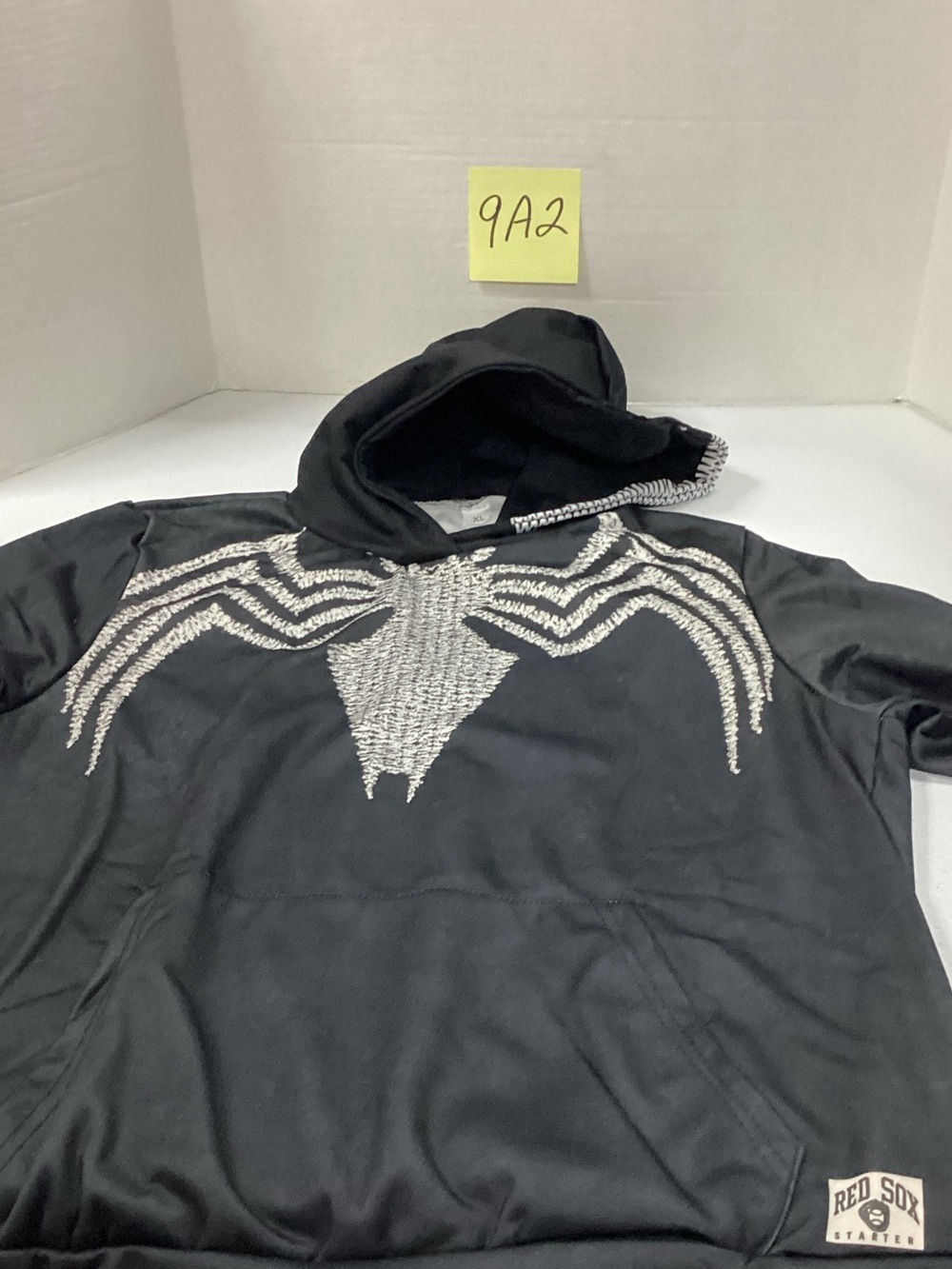 Black Hoodie with Silver Spider Chest Design
